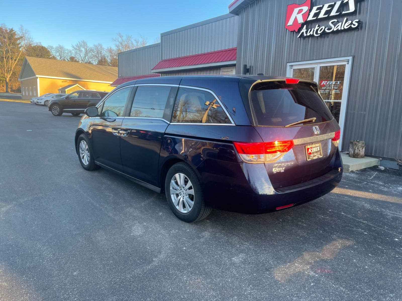 2015 Blue /Gray Honda Odyssey EX-L (5FNRL5H64FB) with an 3.5L V6 SOHC 24V engine, 6-Speed Automatic transmission, located at 11115 Chardon Rd. , Chardon, OH, 44024, (440) 214-9705, 41.580246, -81.241943 - This 2015 Honda Odyssey EX-L offers a luxurious and convenient driving experience, boasting a premium leather interior and sound system, enhancing comfort and entertainment on the go. Its safety and functional features, such as a backup camera, Honda Lane Watch, lane departure warning, and forward c - Photo #9